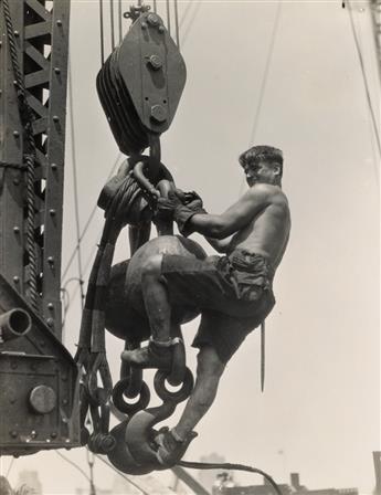 LEWIS W. HINE (1874-1940) Laborer on connector, Empire State Building.